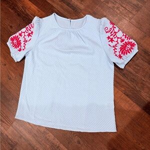 Women’s light blue Embroidered Sleeve Top with Pink Floral Detail